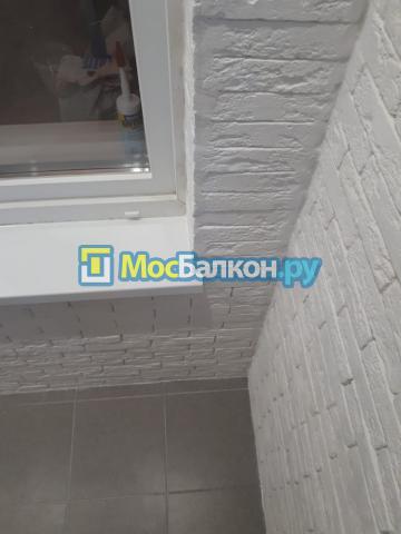 Отделка балкона декоративным камнем