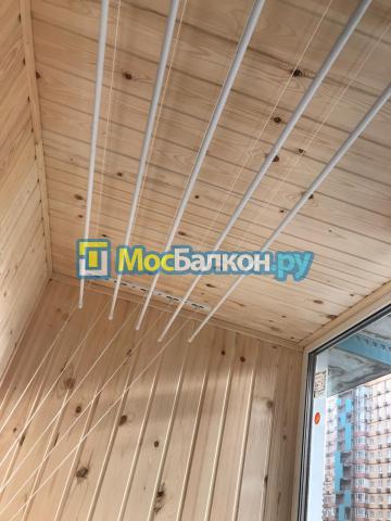 Отделка балкона деревянной вагонкой