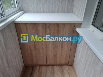 Шкаф на балкон купить в Реутове на заказ недорого от МосБалкон