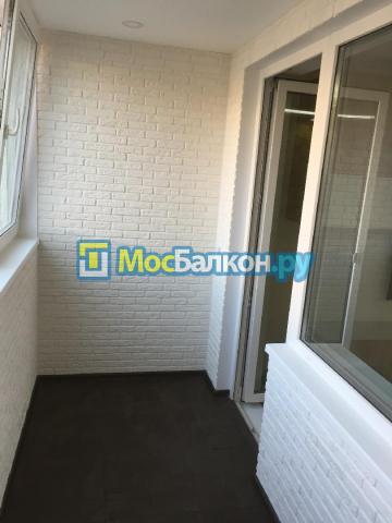 Остекление REHAU и обшивка искусственным камнем